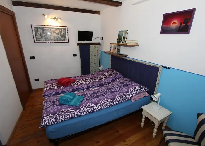 Bilocale Con Terrazzo Maggiore Apartmán *