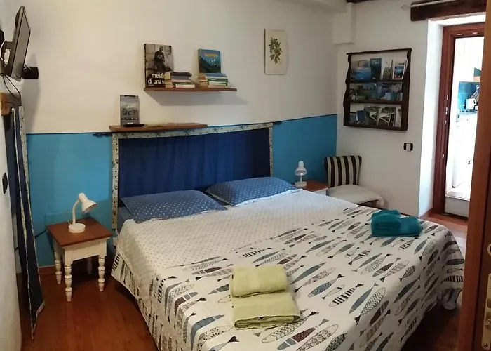 Bilocale Con Terrazzo Maggiore Apartmán